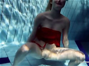 steamy towheaded Lucie French nubile in the pool