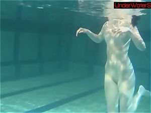 Blackhaired sweetheart Irina underwater